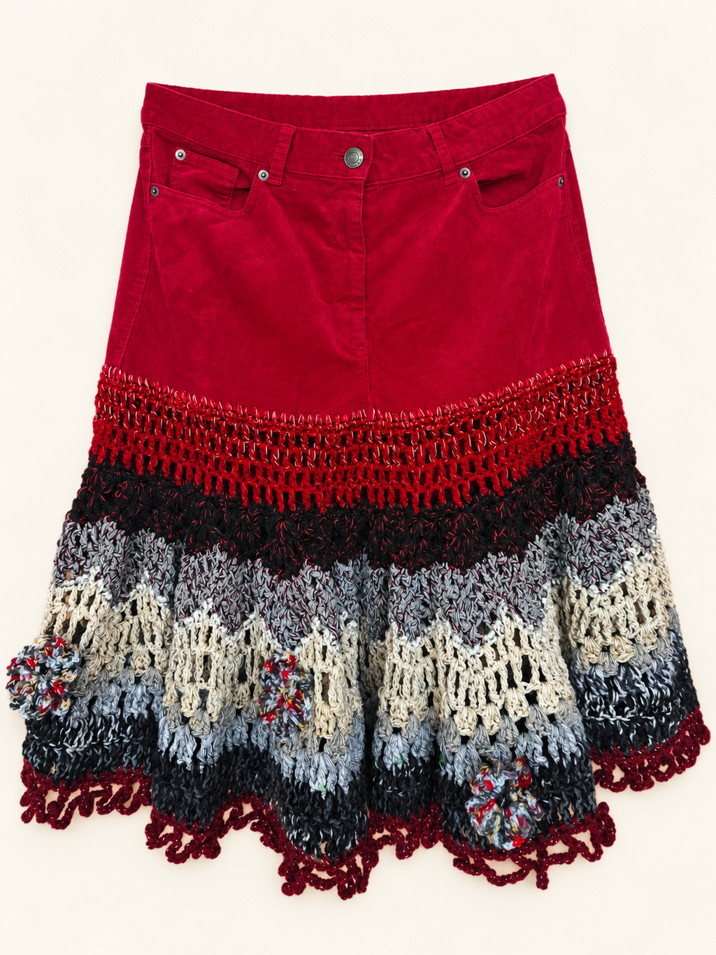 Red corduroy crochet Art Wear skirt — front catalogue view