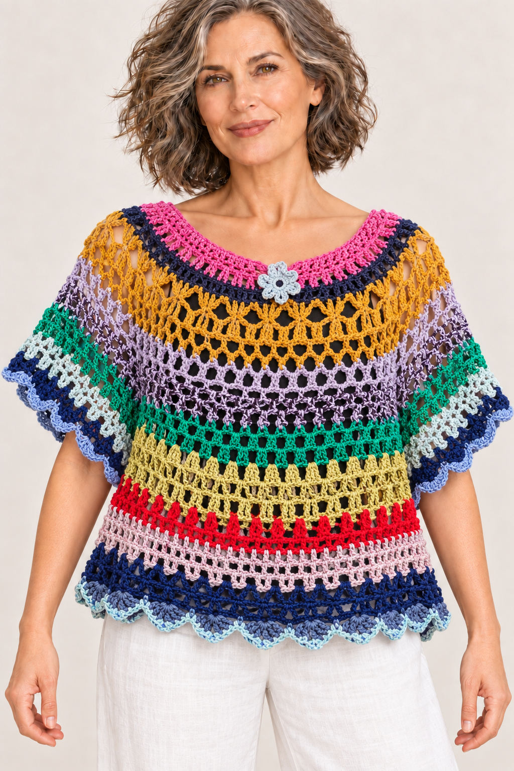 Chromatic Freedom multicolour handmade crochet XXL oversize top on a blonde model, front view