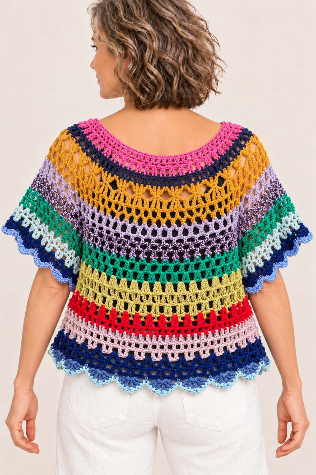 Chromatic Freedom multicolour handmade crochet XXL oversize top on a blonde model, back view