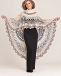 Asymmetric ecru and grey crochet poncho with turtleneck worn by a woman – front view