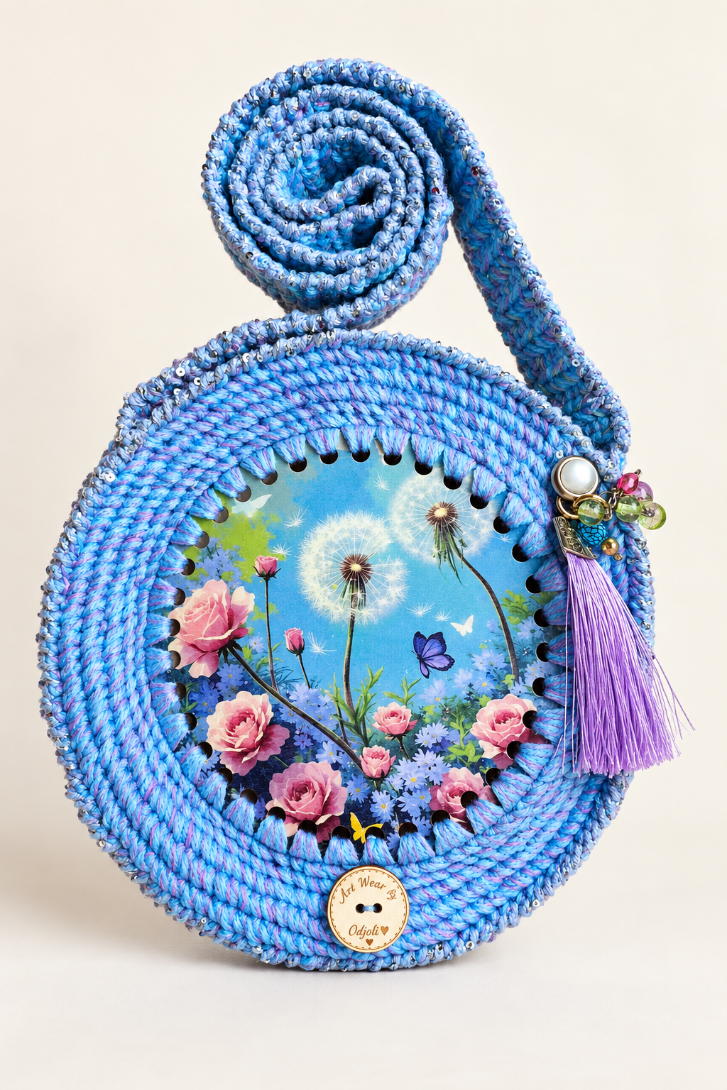 Dandelion Dreams round blue handmade handbag – front view