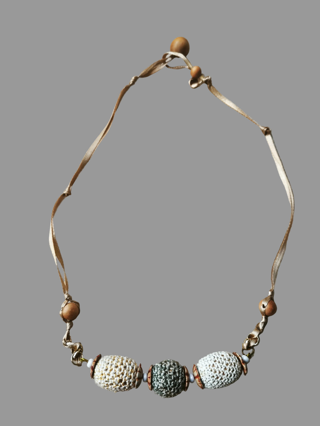 Wooden beads in a setting